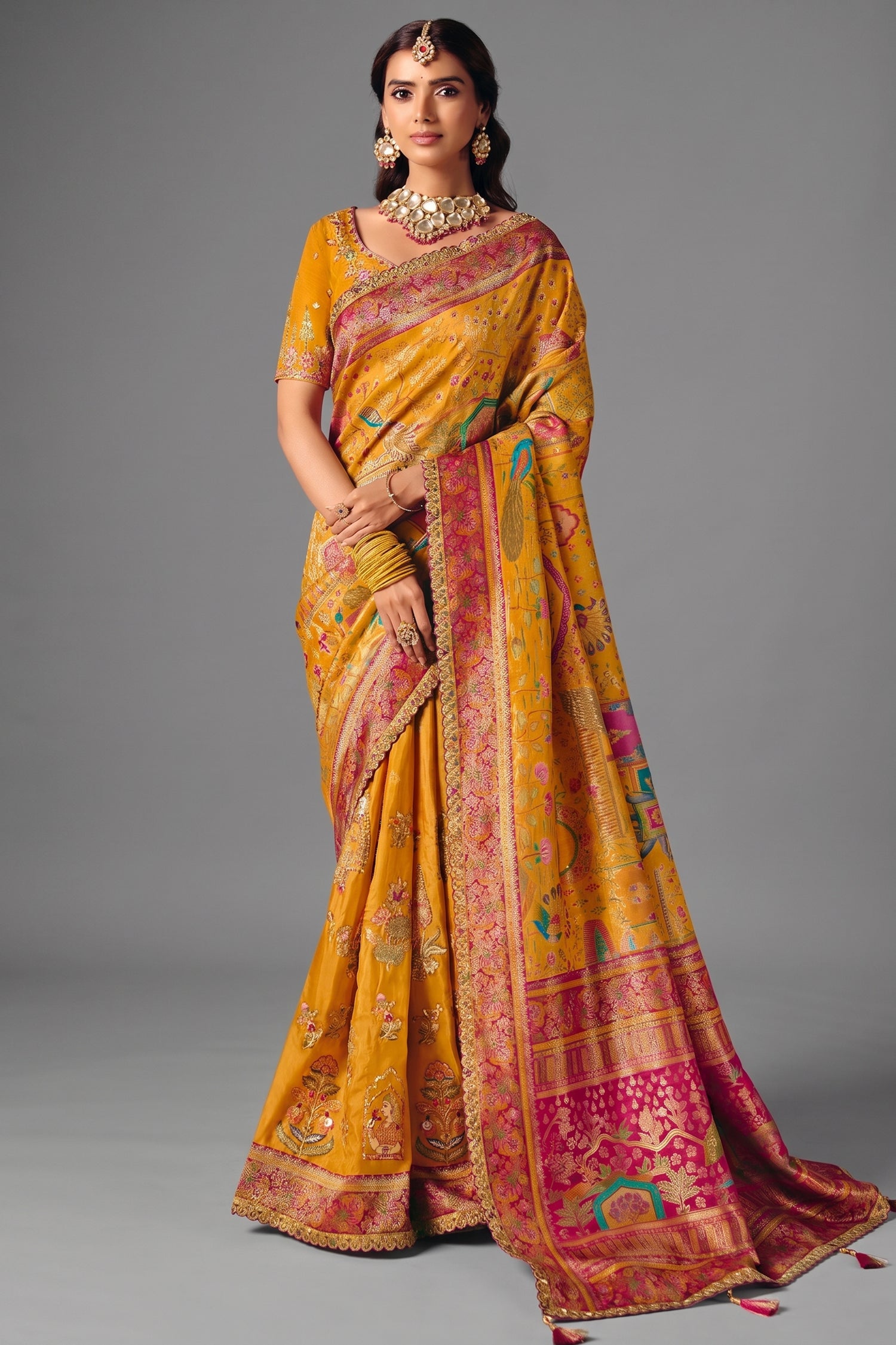 Turmeric Yellow Dola Silk Saree with Rich Pink Embroidered Contrasts Main image