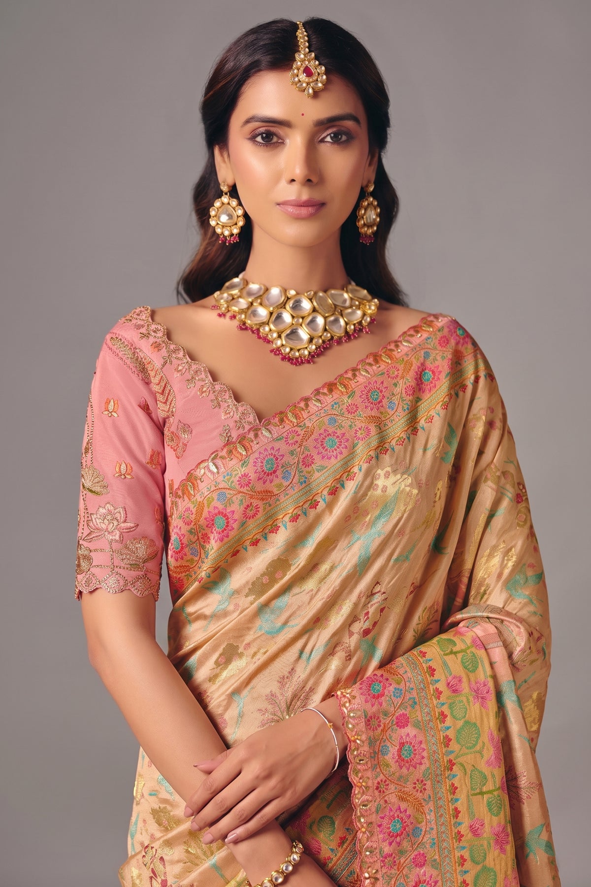Champagne Peach Dola Silk Saree Detailed with Delicate Pastel Threadwork
