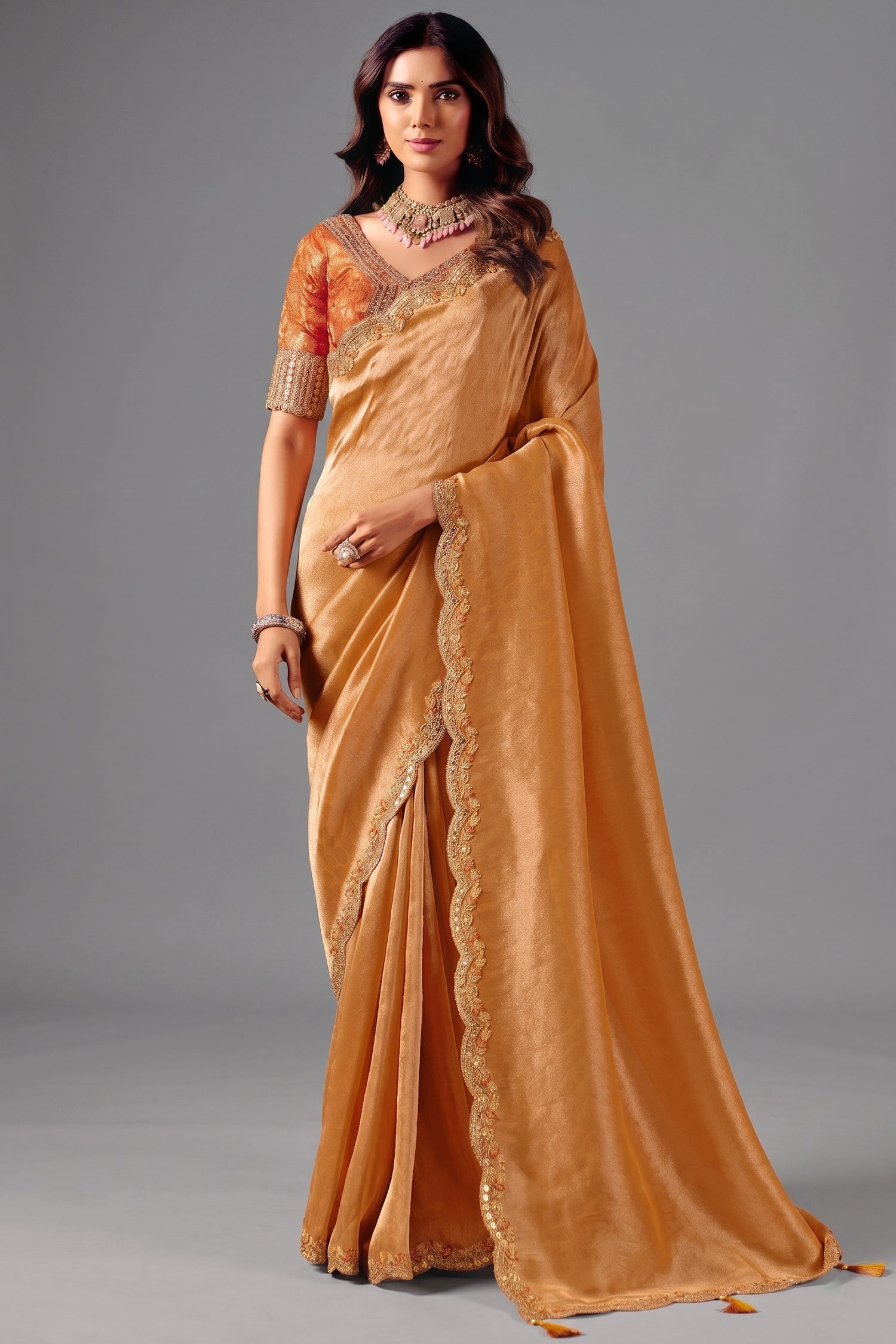 Shimmering Copper Orange Zari Silk Saree with Cutwork Embroidery Main image