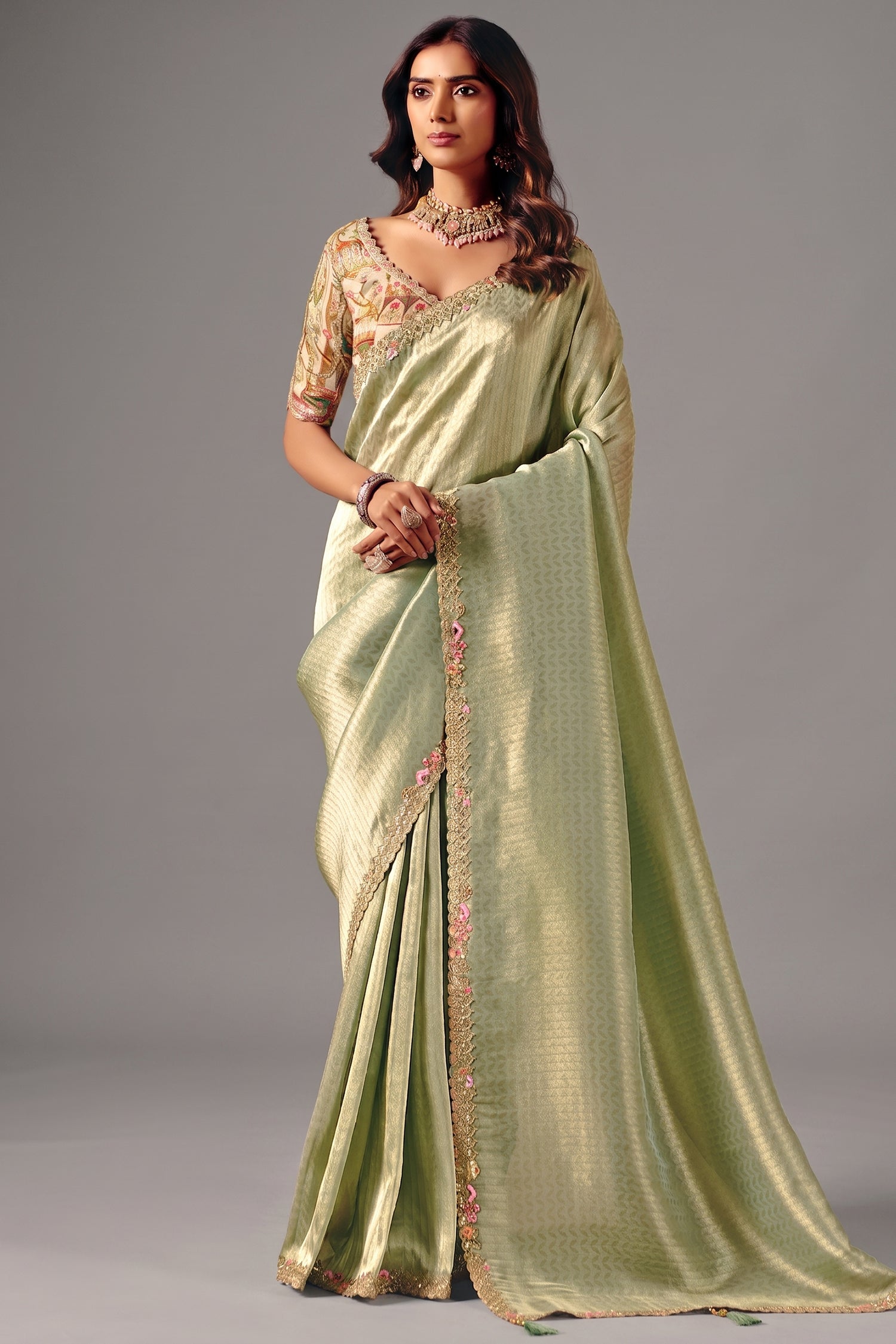 Pale Pista Green Zari Weaving Silk Saree with Embroidered Border Main image
