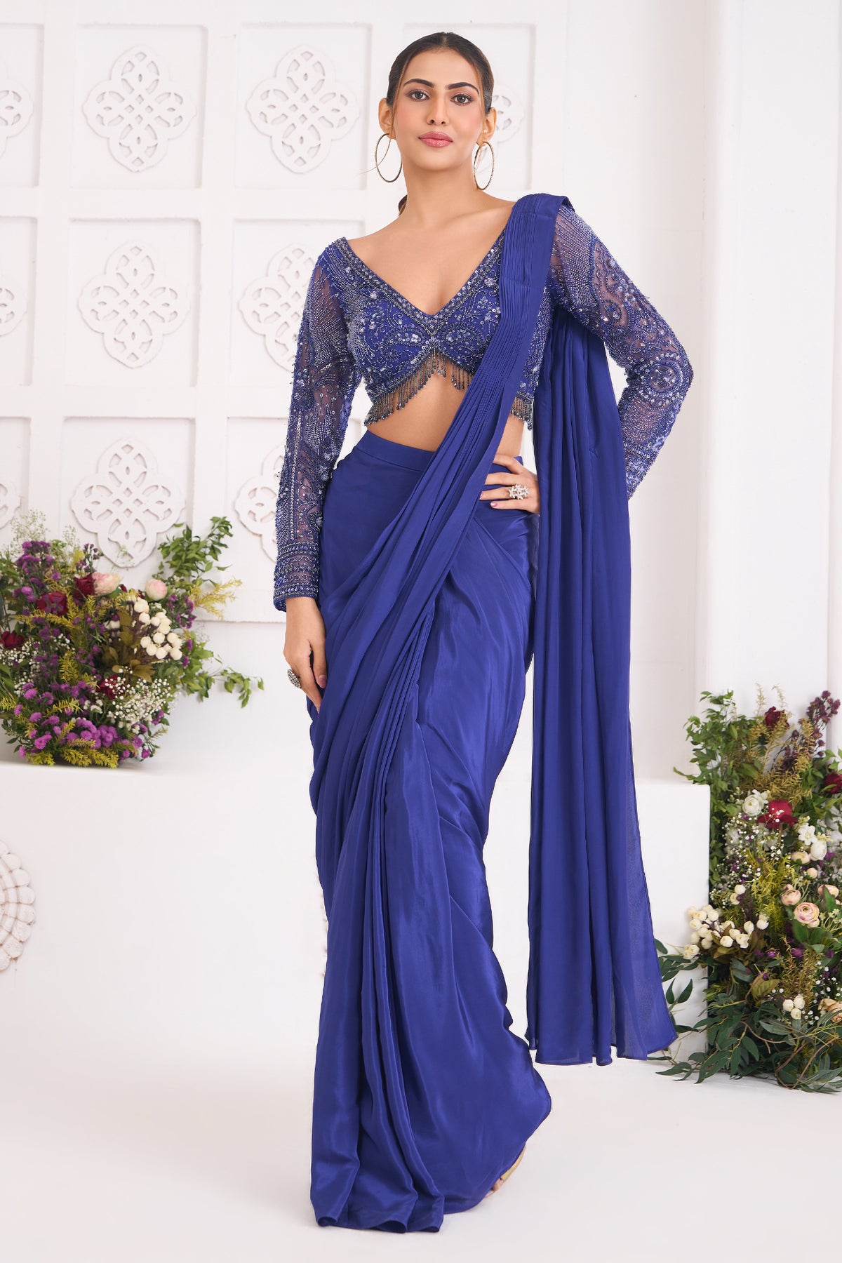 Indigo Blue Crepe Silk Pre-Draped Saree featuring Heavily Hand-Embellished V-Neck Full Sleeve Blouse