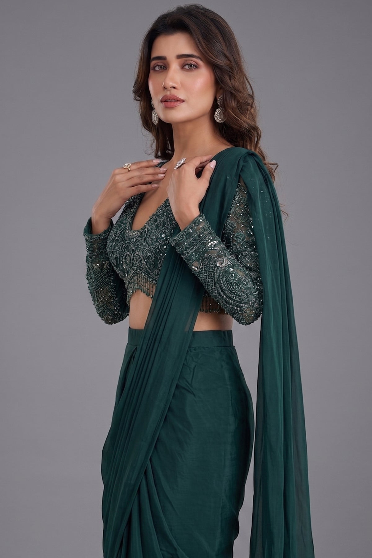 Bottle Green Crepe Silk Pre-Draped Saree featuring Heavily V-Neck Sequin Cutdana Choli with Hanging Beads Fringe