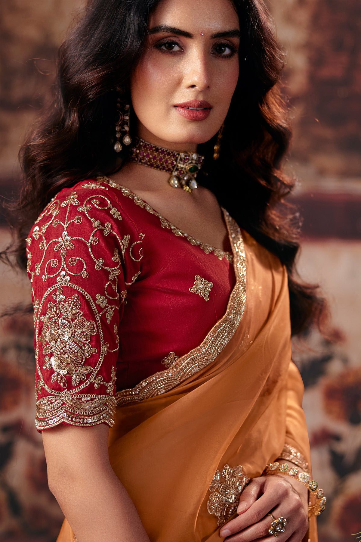 Ochre Orange Organza Saree with Zari Embroidered Border