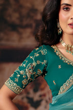 Sea Green Organza Saree with Intricate Border Work