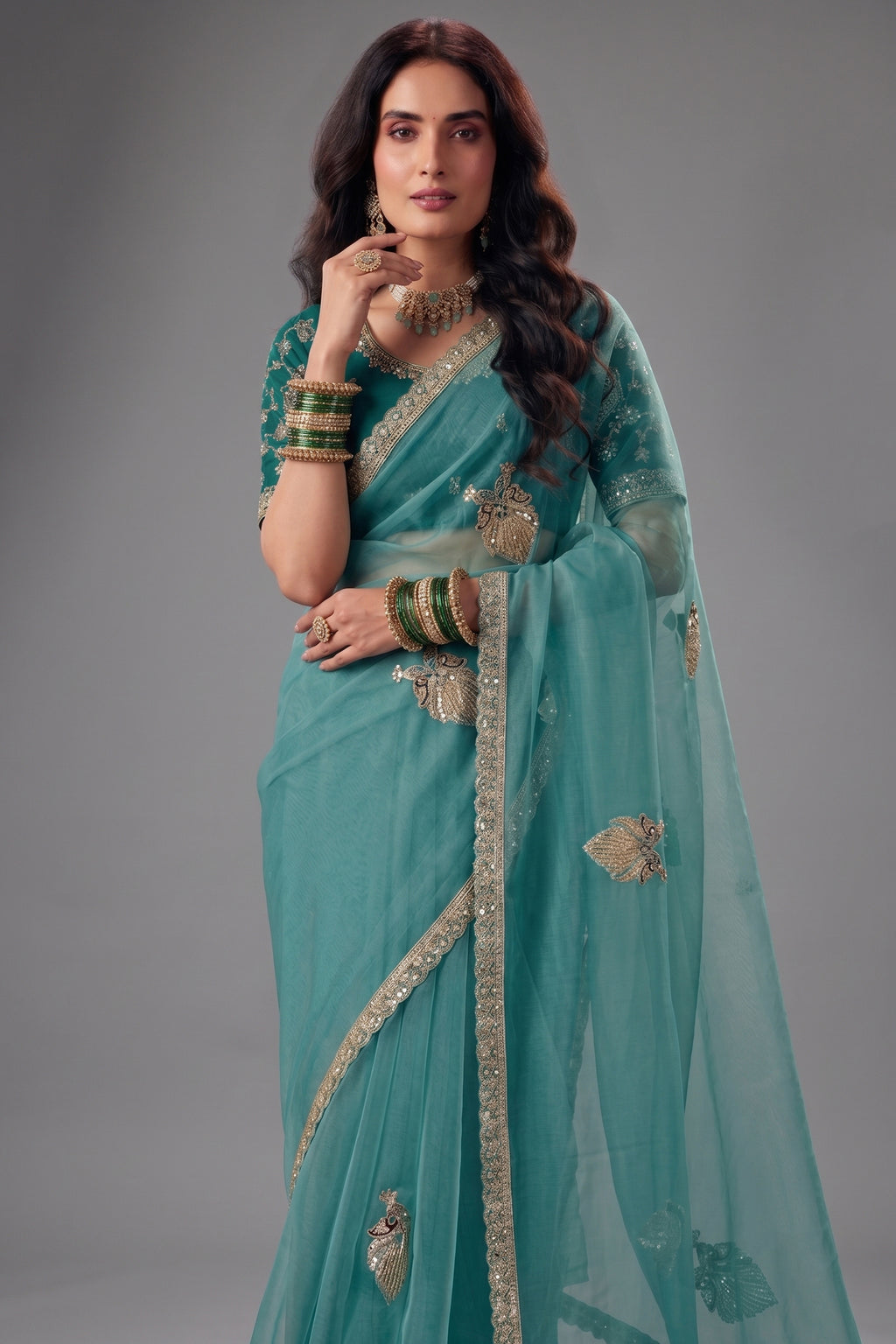 Sea Green Organza Saree with Intricate Border Work