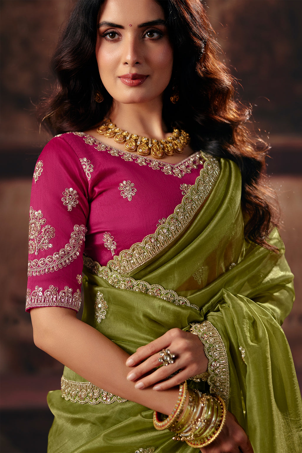 Moss Green Organza Saree with Embroidered Floral Border