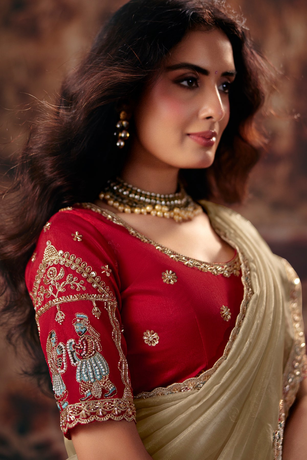 Muted Cream Organza Saree with Subtle Embroidered Buttashork