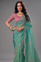 Pastel Mint Green Organza Saree with Delicate Embroidered Border