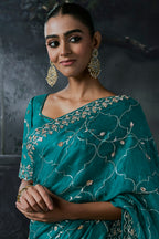 Rich Teal Turquoise Tissue Silk Saree with Allover Sequins & Stone Border Work