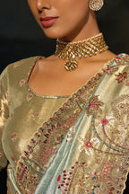Pista Green Madhurai Silk Saree featuring Ornate Zardosi & Cutdana Hand Art