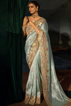 Pista Green Madhurai Silk Saree featuring Ornate Zardosi & Cutdana Hand Art