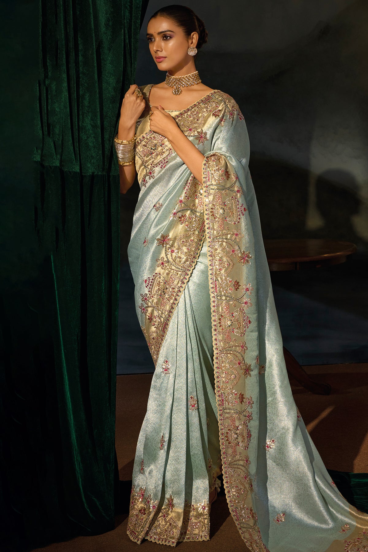 Pista Green Madhurai Silk Saree featuring Ornate Zardosi & Cutdana Hand Art