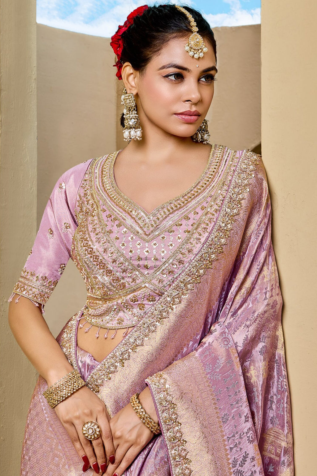 Soft Lavender Metallic Tissue Saree detailed with Intricate Weaving