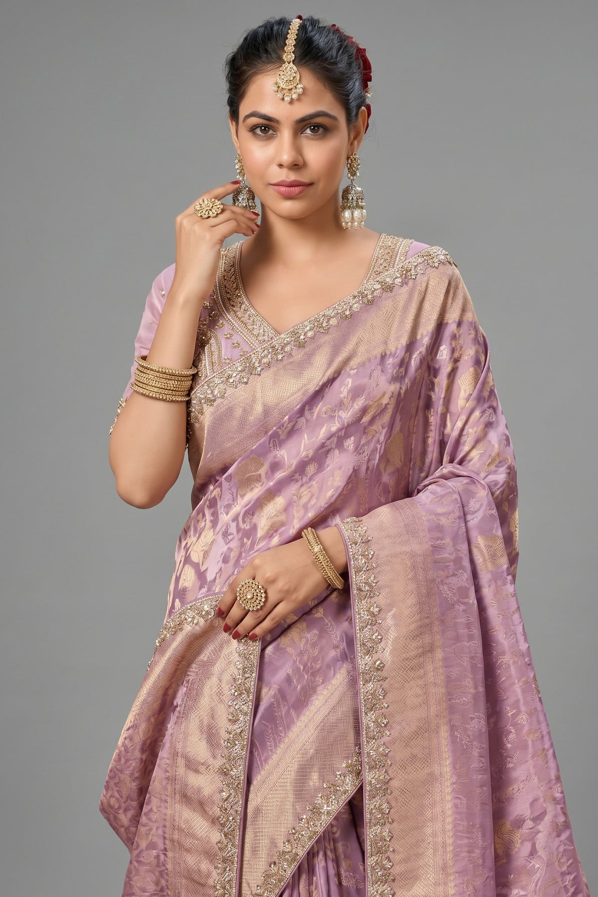 Soft Lavender Metallic Tissue Saree detailed with Intricate Weaving
