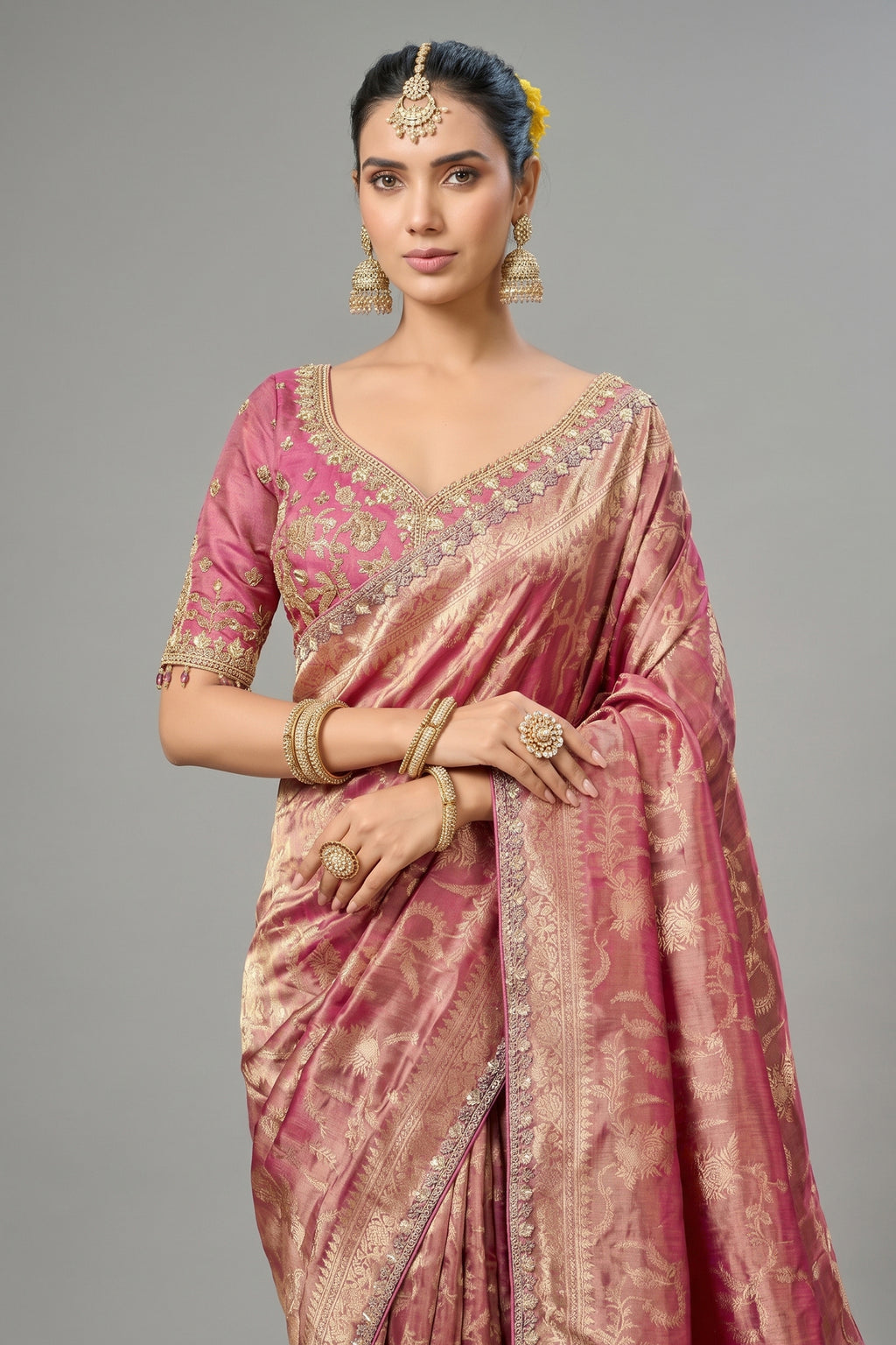 Rich Magenta Metallic Tissue Saree detailed with Intricate Weaving & Pearl-Beads Accent