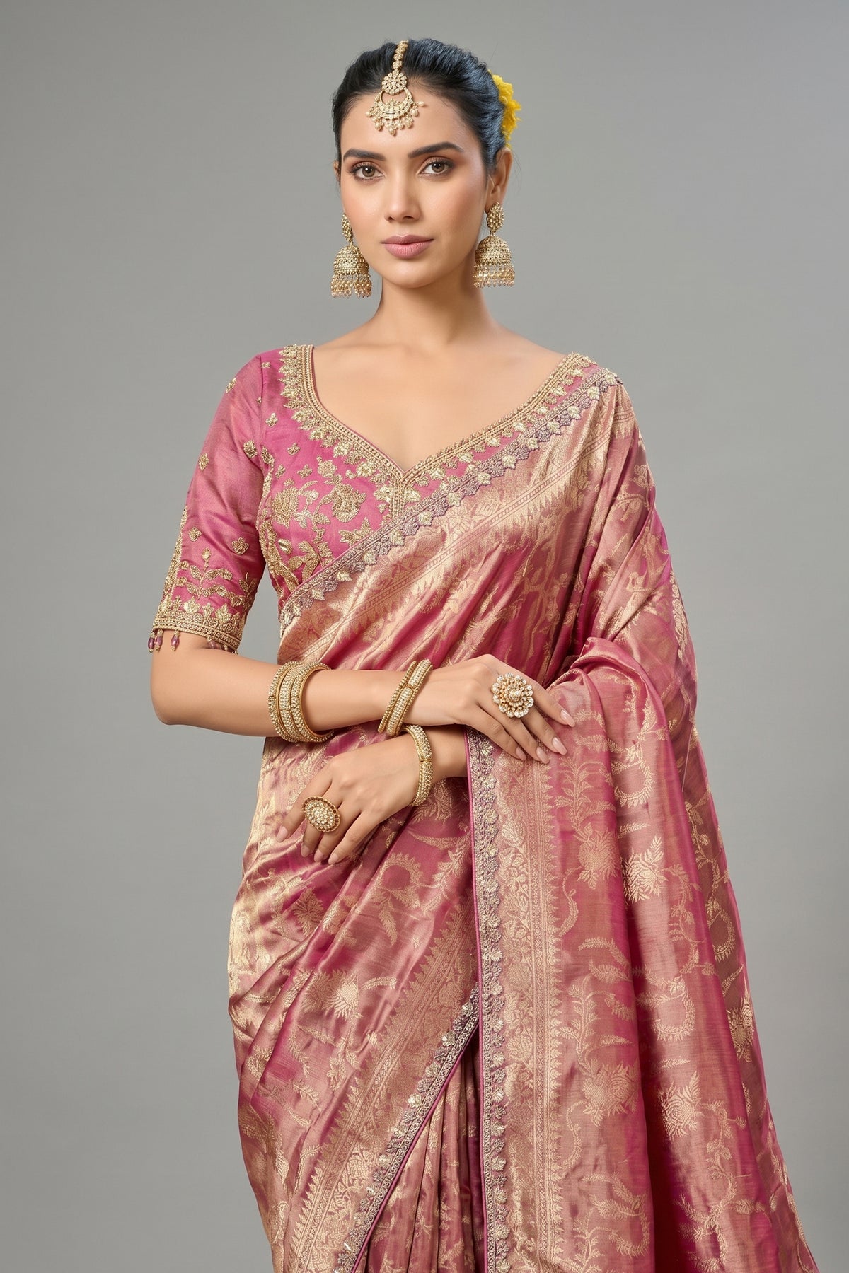 Rich Magenta Metallic Tissue Saree detailed with Intricate Weaving & Pearl-Beads Accent
