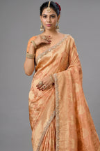 Warm Peach Metallic Tissue Saree detailed with Intricate Weaving