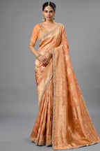 Warm Peach Metallic Tissue Saree detailed with Intricate Weaving