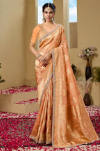 Warm Peach Metallic Tissue Saree detailed with Intricate Weaving