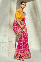 Rani Pink Pure Georgette Bandhej Saree with Contrast Yellow Blouse & Heavy Moti Work