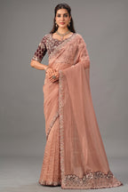 Peach Crush Tissue Saree highlighted with Shimmering Sequins and Pearls