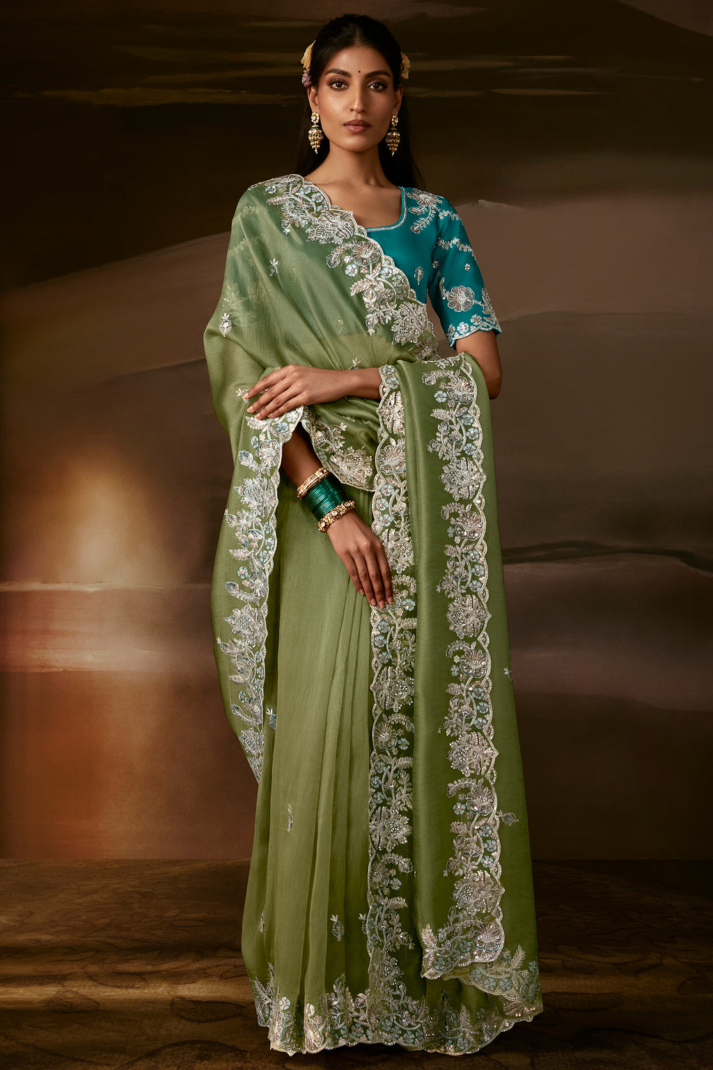 Sage Green Organza Saree with Elegant Aari Work