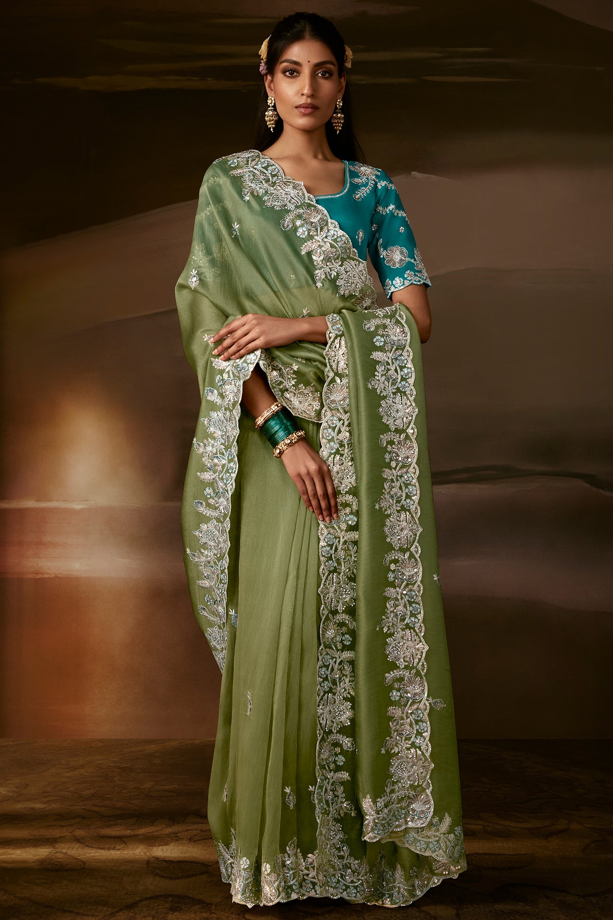 Sage Green Organza Saree with Elegant Aari Work