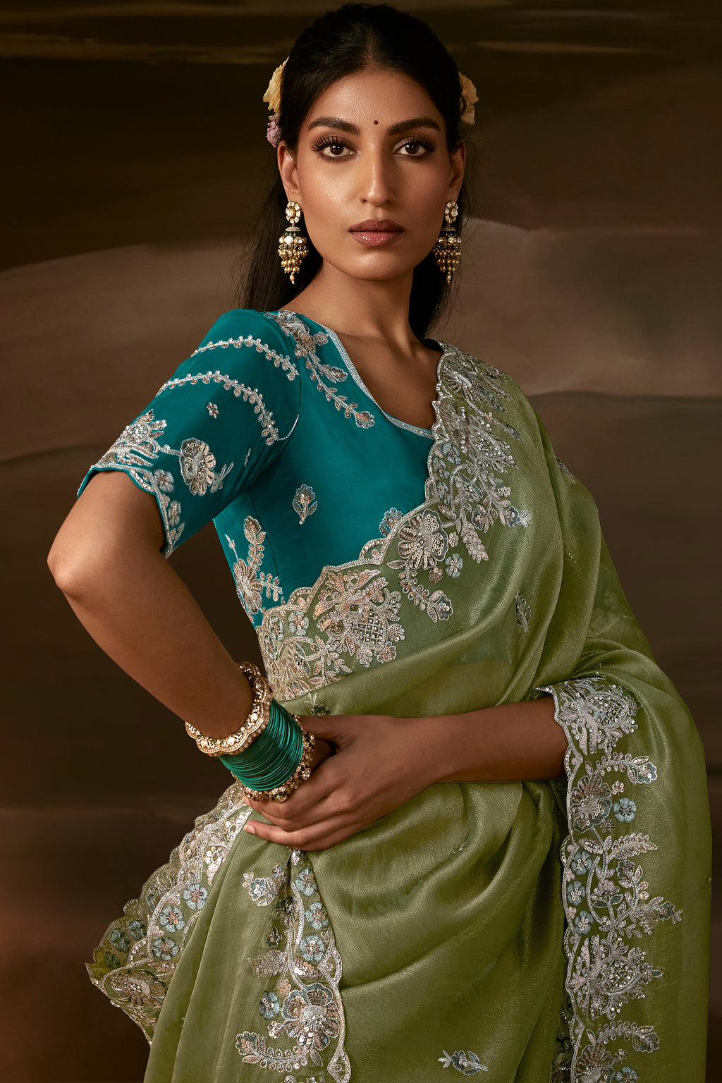 Sage Green Organza Saree with Elegant Aari Work
