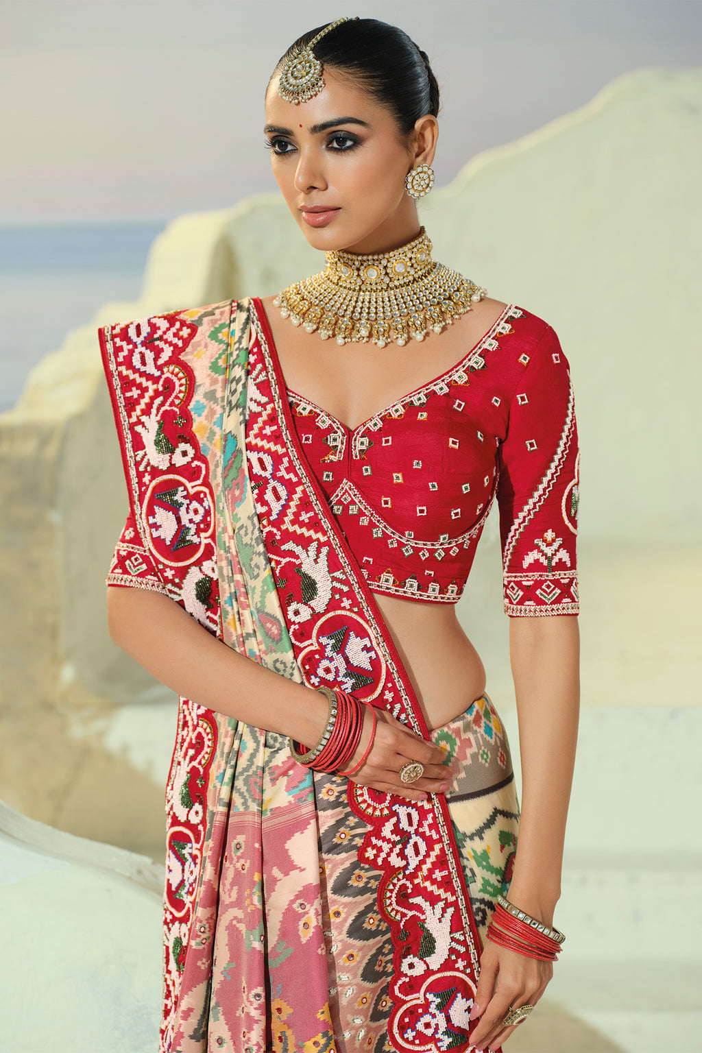 Cream Silk Traditional Patola Saree with Contrast Beaded Border
