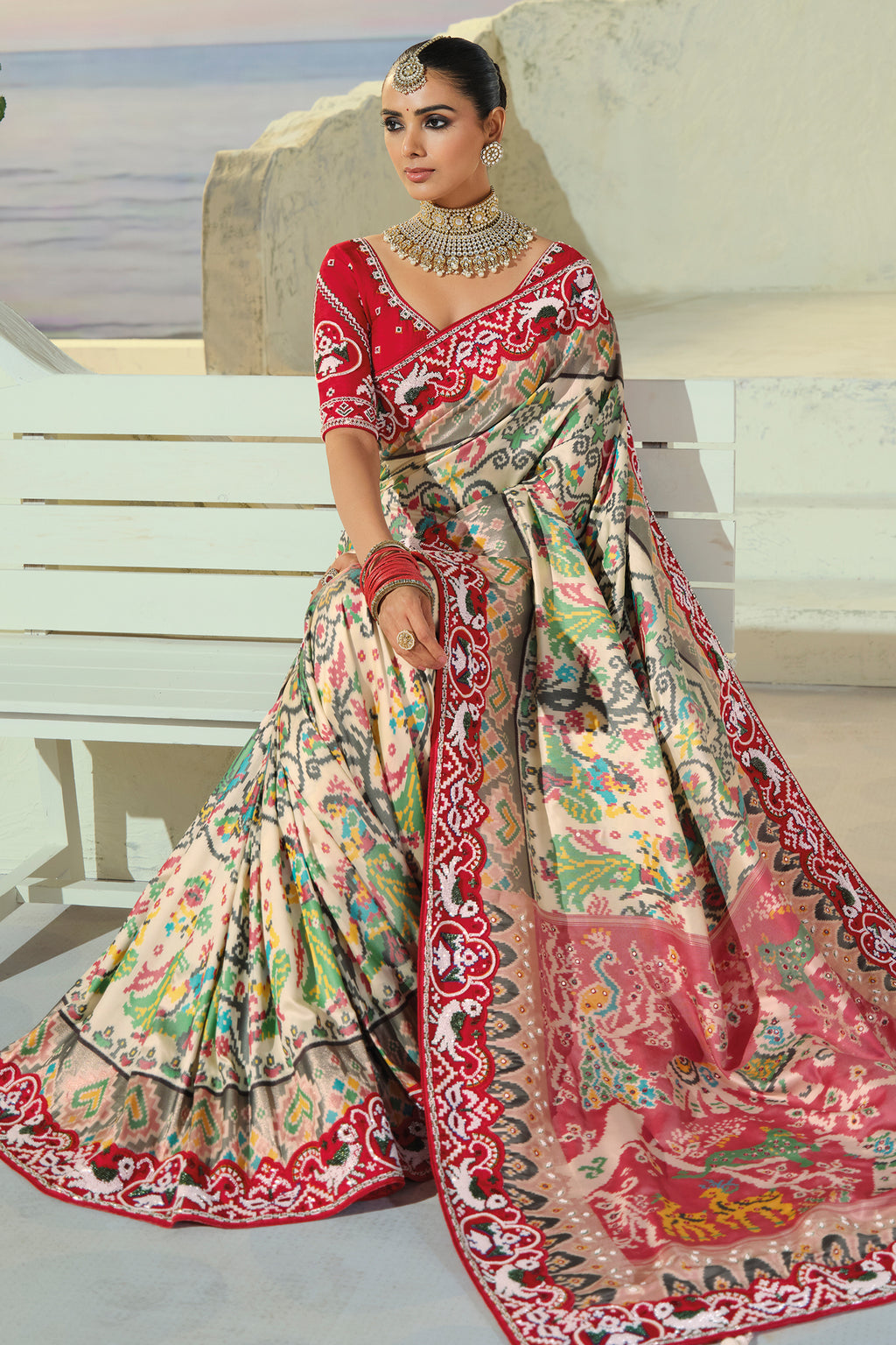 Cream Silk Traditional Patola Saree with Contrast Beaded Border