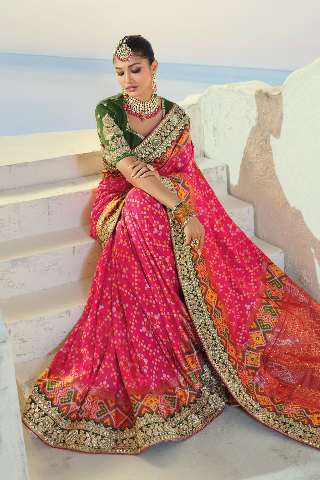 Rani Pink Silk Traditional Patola Saree with Embroidery and Sequin Work