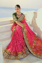 Rani Pink Silk Traditional Patola Saree with Embroidery and Sequin Work
