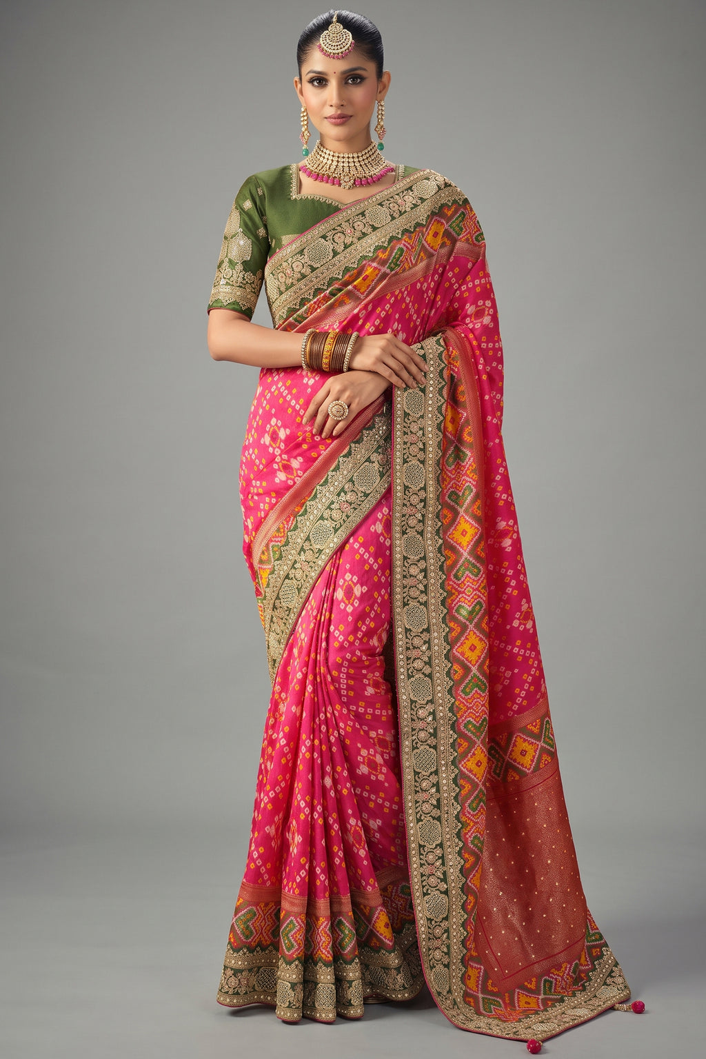 Rani Pink Silk Traditional Patola Saree with Embroidery and Sequin Work
