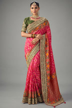 Rani Pink Silk Traditional Patola Saree with Embroidery and Sequin Work