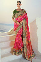 Rani Pink Silk Traditional Patola Saree with Embroidery and Sequin Work