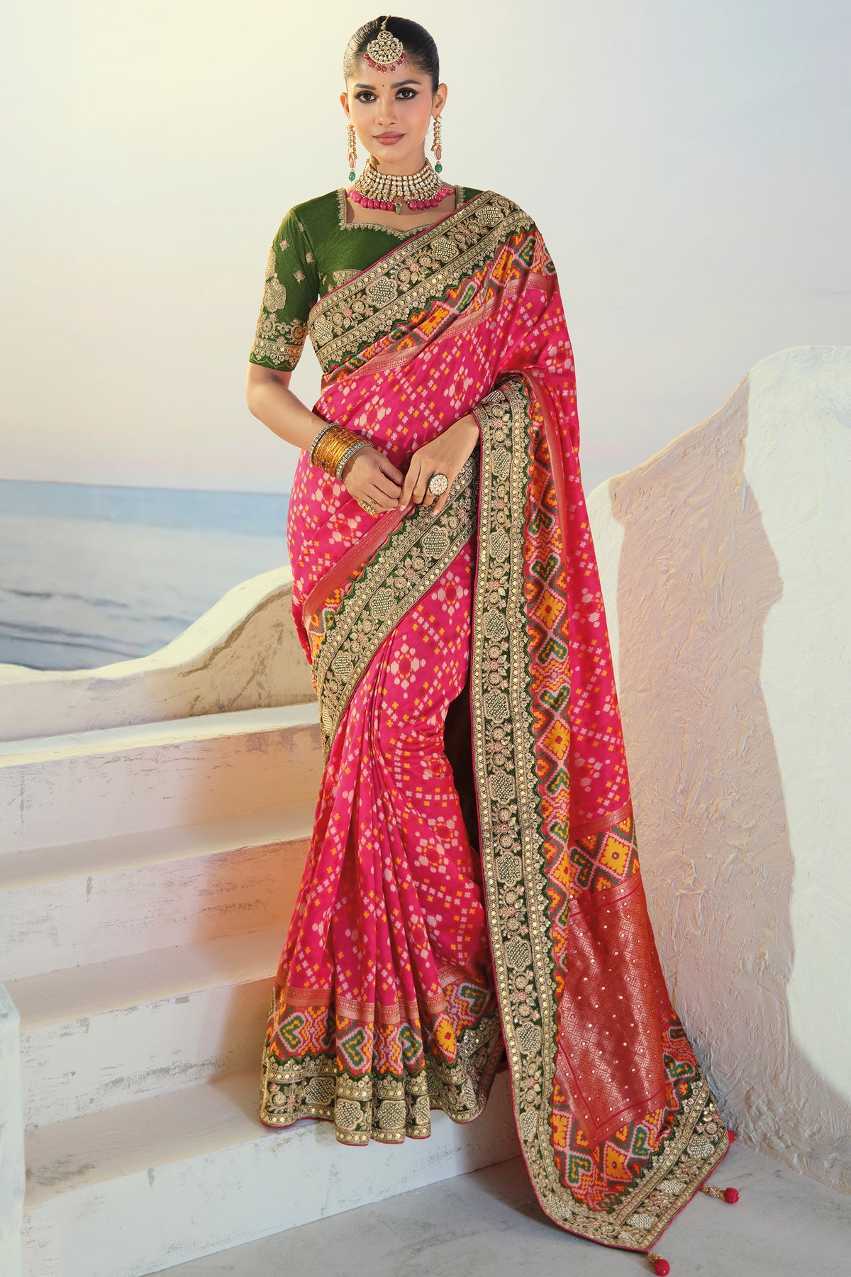 Rani Pink Silk Traditional Patola Saree with Embroidery and Sequin Work