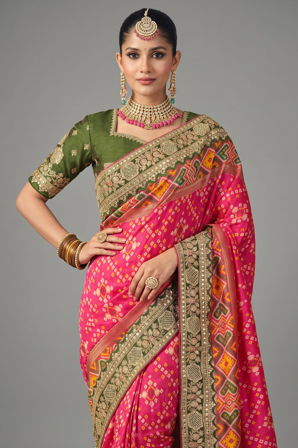 Rani Pink Silk Traditional Patola Saree with Embroidery and Sequin Work