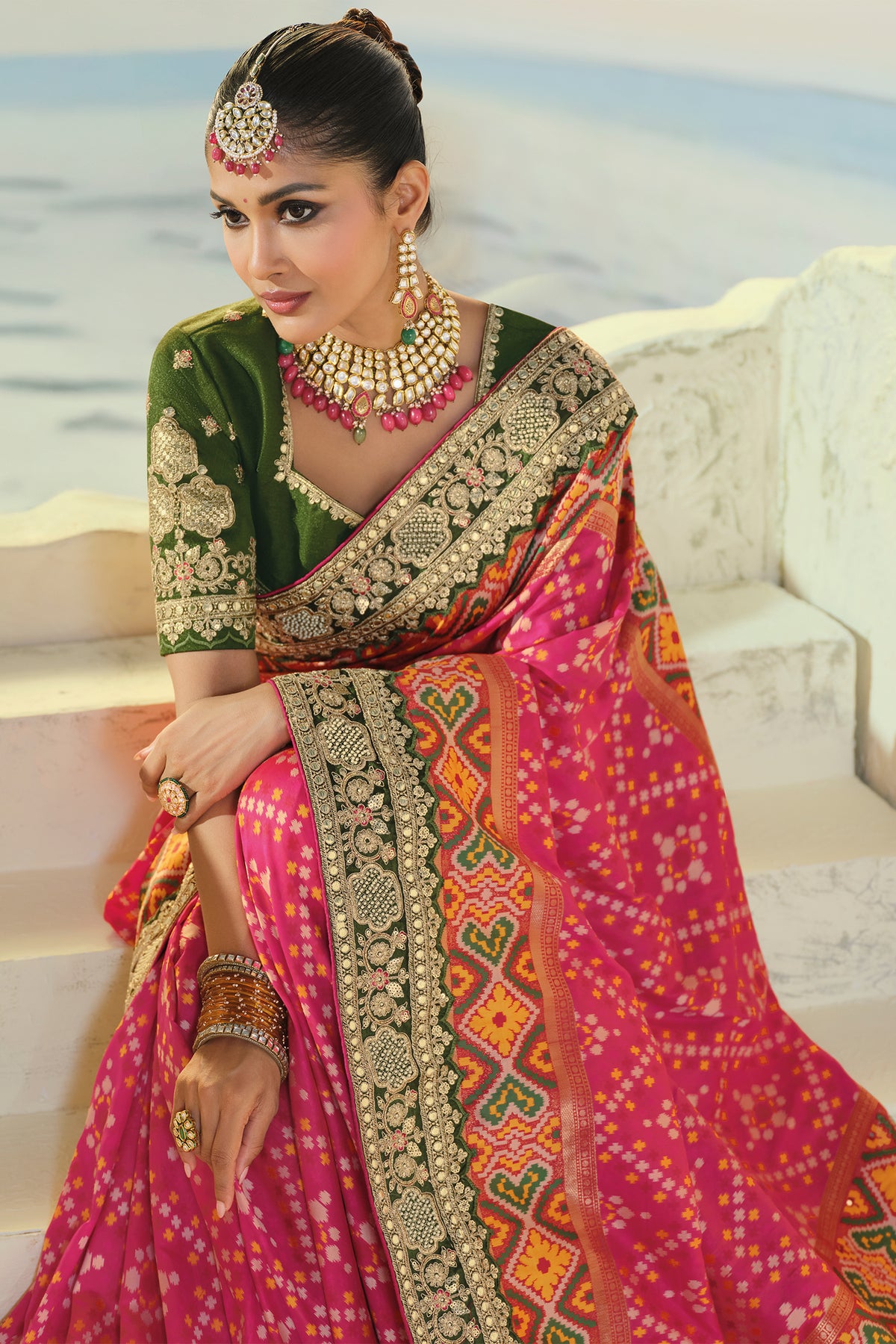 Rani Pink Silk Traditional Patola Saree with Embroidery and Sequin Work