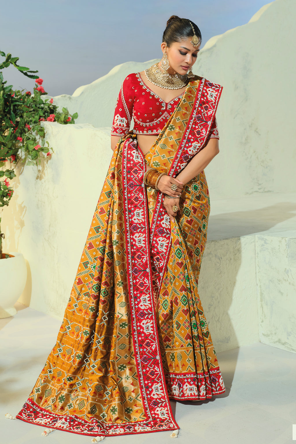 Yellow Silk Traditional Woven Patola Saree with Beaded Contrast Border