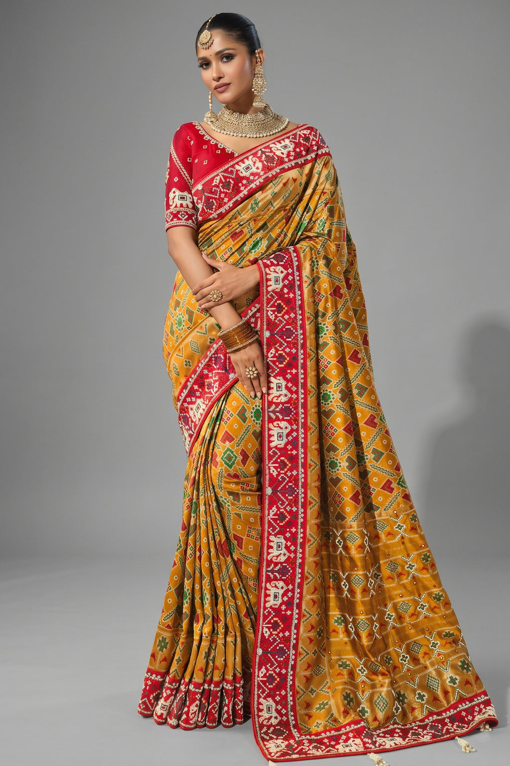 Yellow Silk Traditional Woven Patola Saree with Beaded Contrast Border