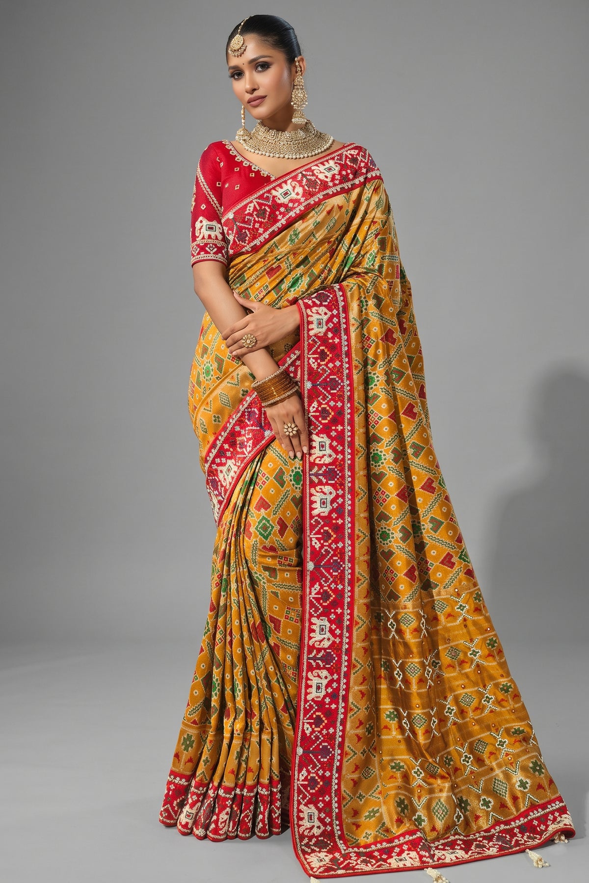 Yellow Silk Traditional Woven Patola Saree with Beaded Contrast Border