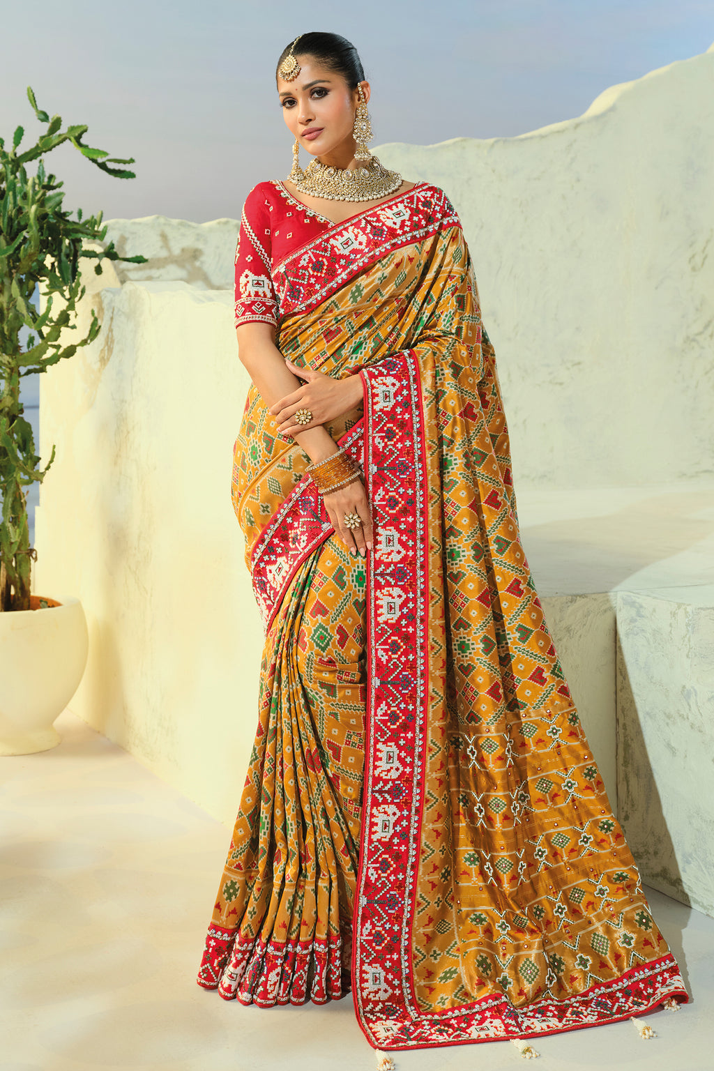 Yellow Silk Traditional Woven Patola Saree with Beaded Contrast Border