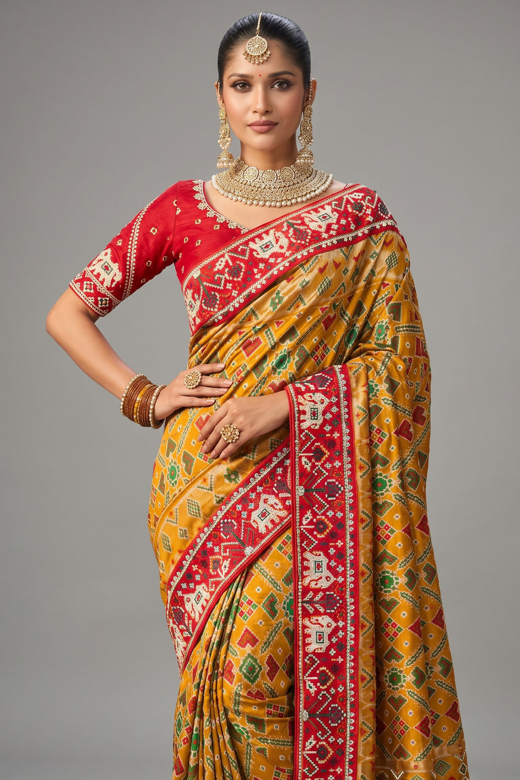 Yellow Silk Traditional Woven Patola Saree with Beaded Contrast Border