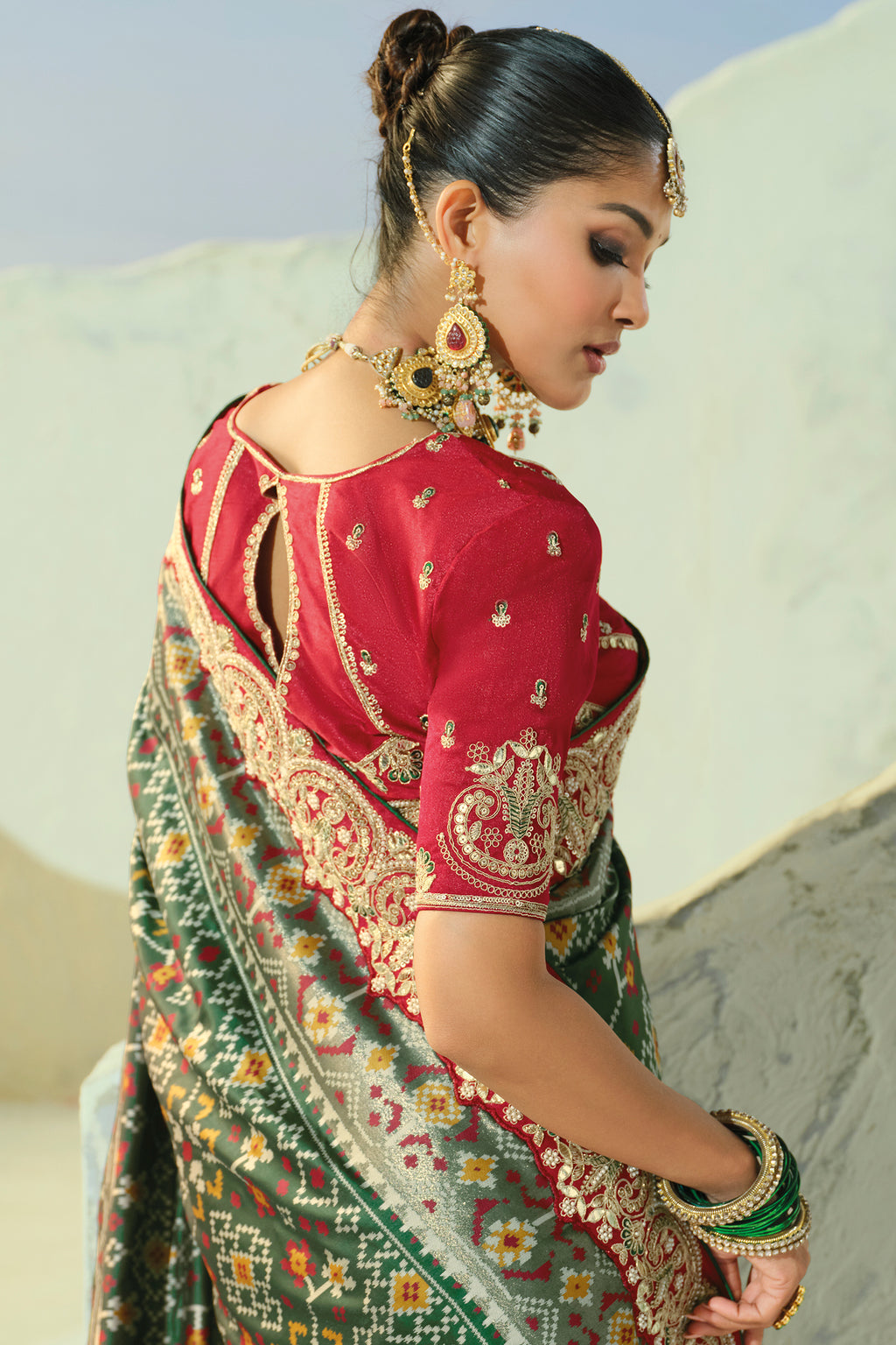 Dark Green Silk Traditional Woven Saree with Embroidered Border