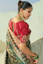 Dark Green Silk Traditional Woven Saree with Embroidered Border