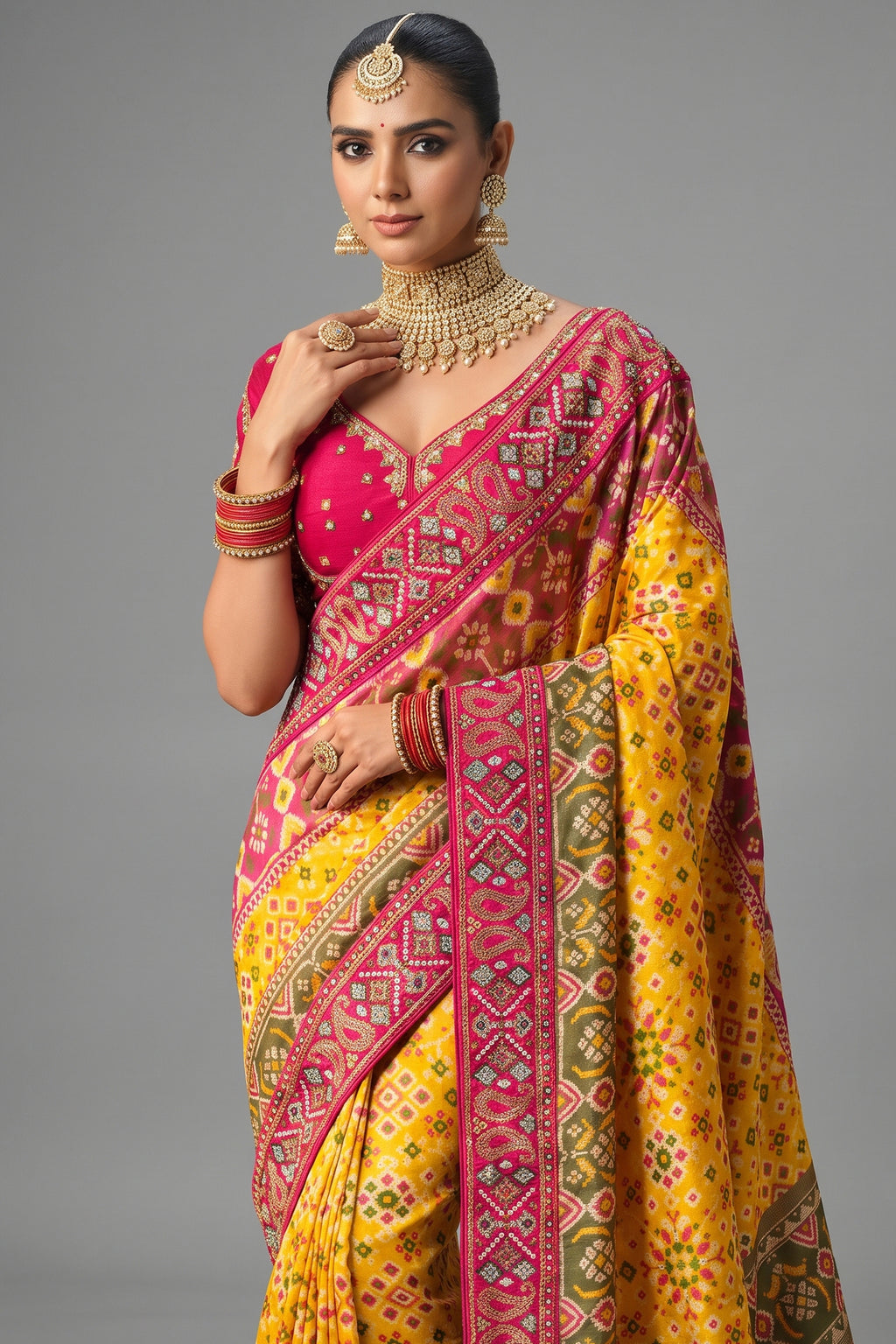 Yellow Silk Woven Patola Traditional Saree with Contrast Beaded Border