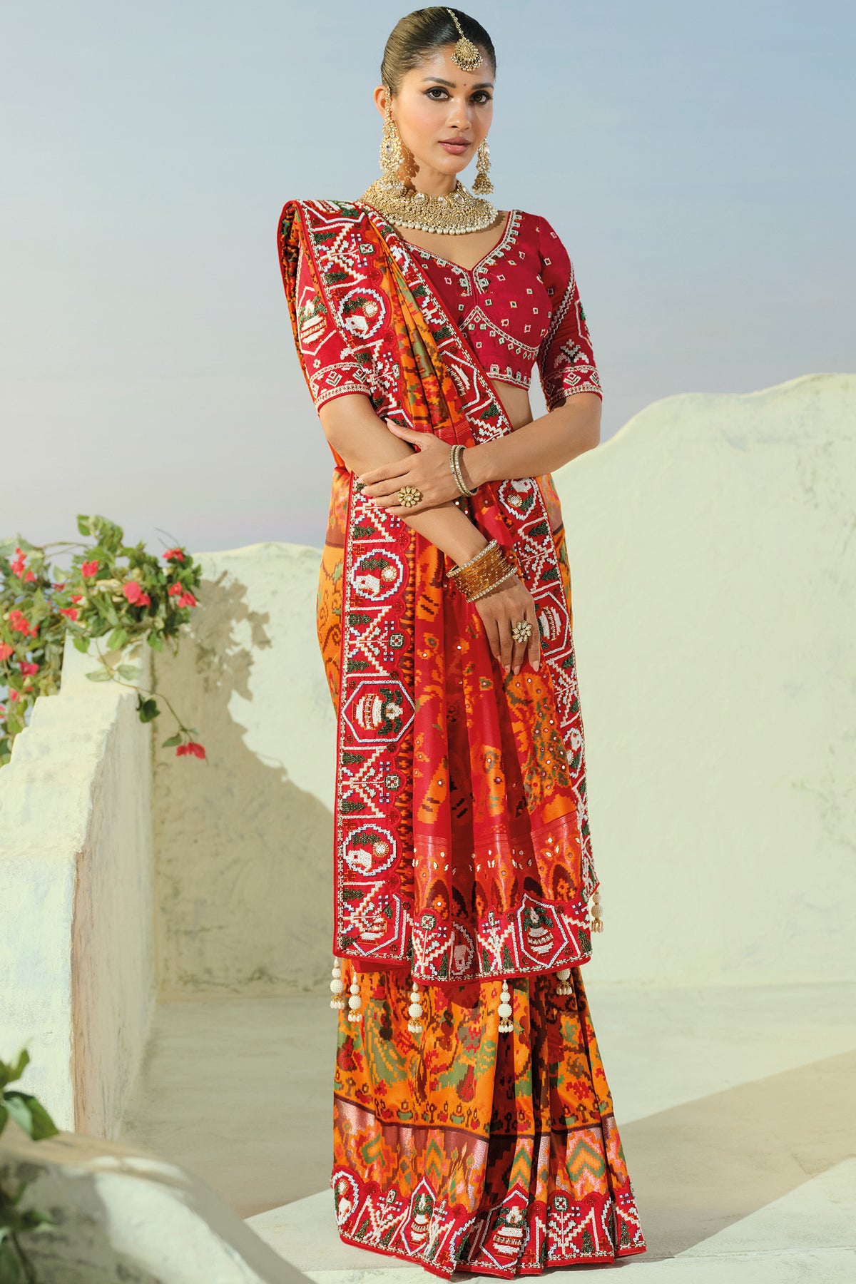 Orange Silk Traditional Woven Patola Saree with Contrast Beaded Work Border