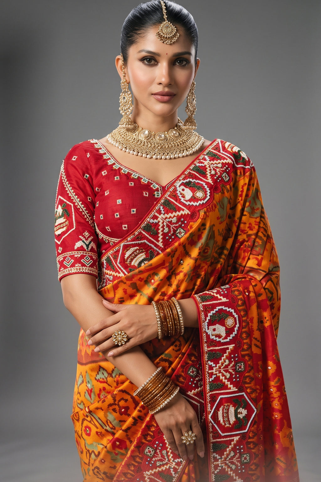 Orange Silk Traditional Woven Patola Saree with Contrast Beaded Work Border