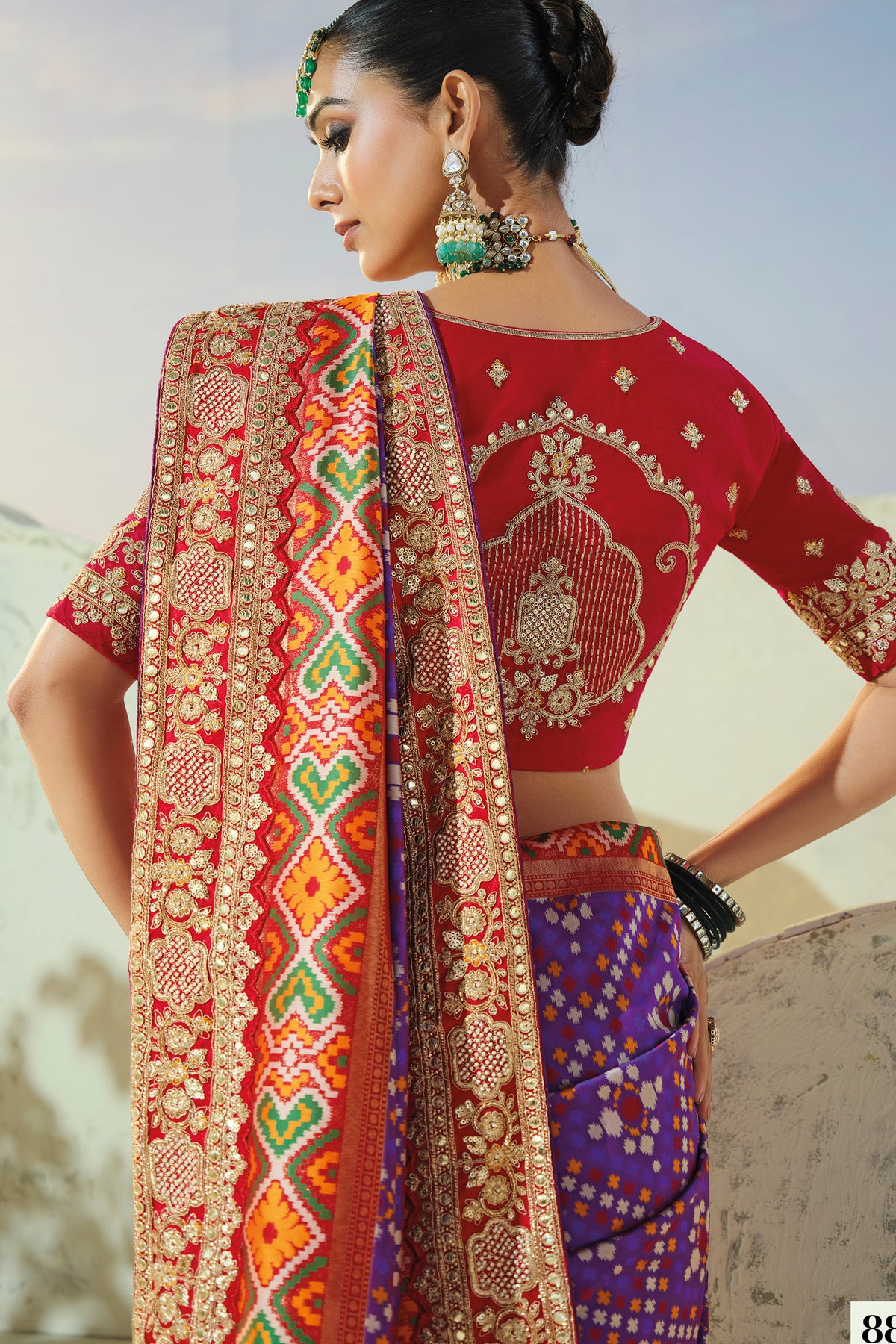 Purple Silk Traditional Woven Patola Saree with Contrast Embroidered Border