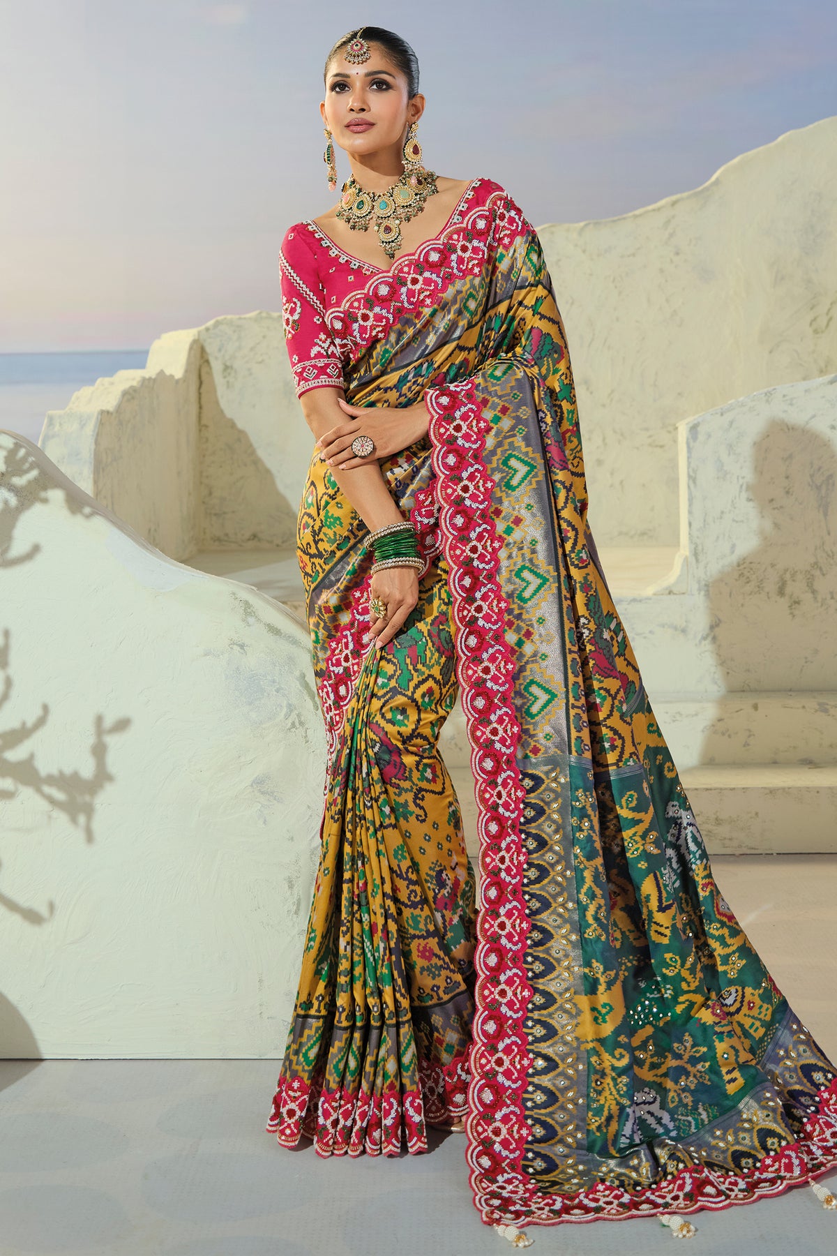 Mustard Silk Traditional Woven Patola Saree with Contrast Beaded Border and Pallu